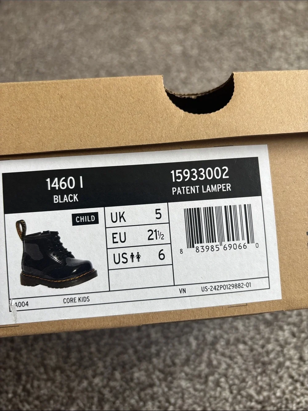 Dr. Martens Kids Black Patent Lace-Up Boots with Yellow Stitching